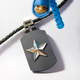 Illustration for article titled Lightning Review: Olinari Dog Tags Hold, Secure Your Flash Memory